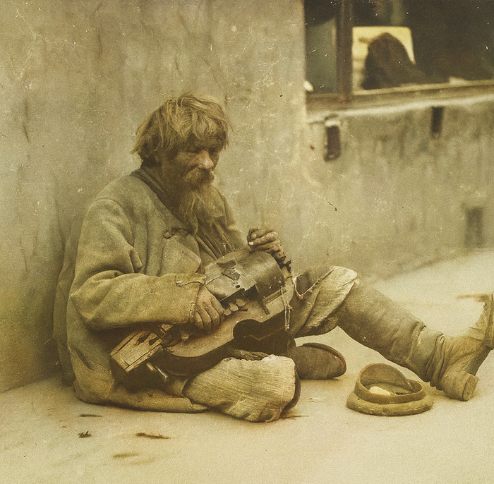 Николай Свищов-Паола. Музыкант на тротуаре. 1900-е.