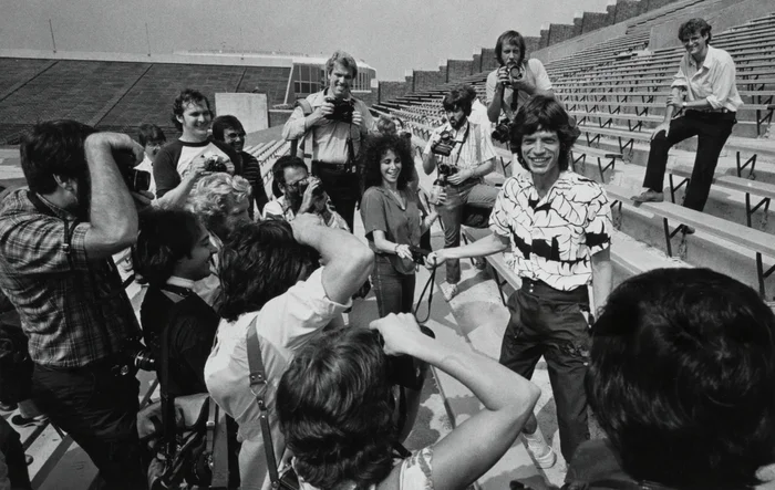 Мик Джаггер встречается с американской прессой на стадионе имени Джона Ф. Кеннеди в Филадельфии, чтобы объявить о предстоящем туре Rolling Stones по США. 26 августа 1981 года. Фото из архива Майкла Окса. Мик Джаггер встречается с американской прессой на стадионе имени Джона Ф. Кеннеди в Филадельфии, чтобы объявить о предстоящем туре Rolling Stones по США. 26 августа 1981 года. Фото из архива Майкла Окса.