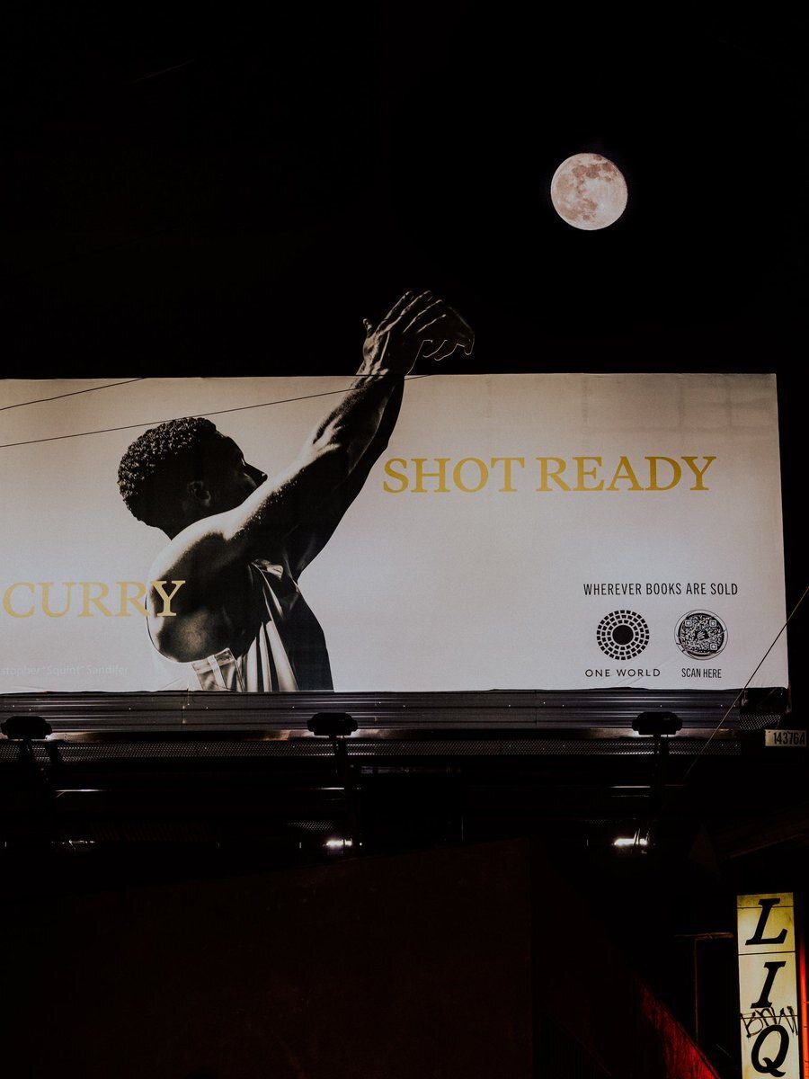 A billboard advertising NBA star Stephen Curry's new book - The gods of marketing, Creative, NBA, Telegram (link)