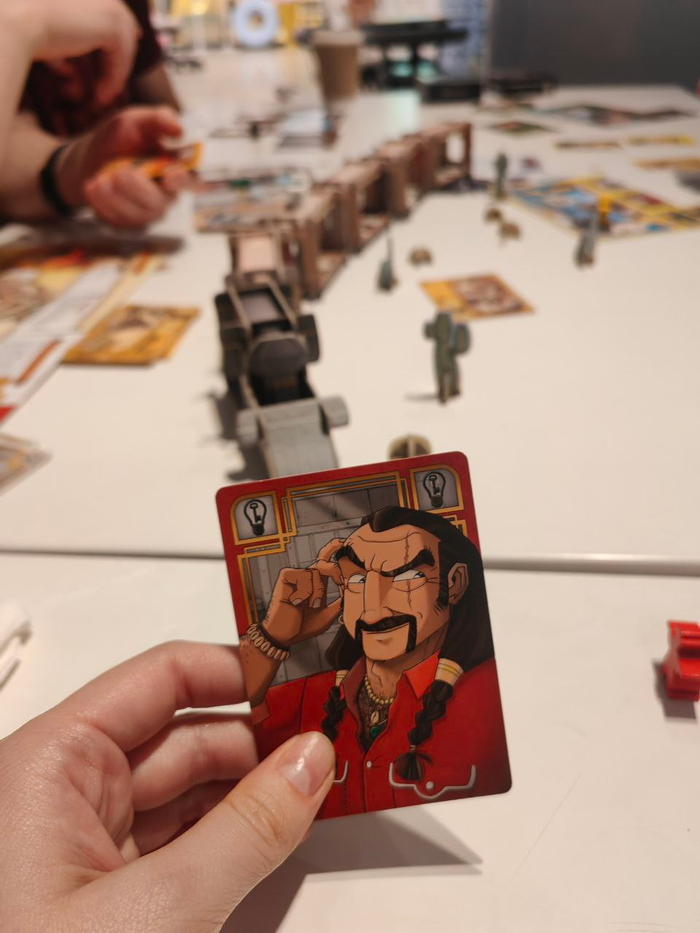 а это я пытаюсь захватить все деньги в поезде и стать успешнее остальных грабителей в мире Дикого Запада настольной игры "Кольт Эксперсс"