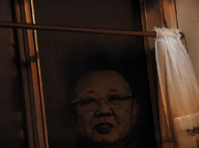 In 2 am very respected comrade Clover woke up and noticed a scary and terrifying face in her window. This was Kim jong Il. Comrade Clover was scared as hell, this scary dark maniac just stared at her and didn't move.