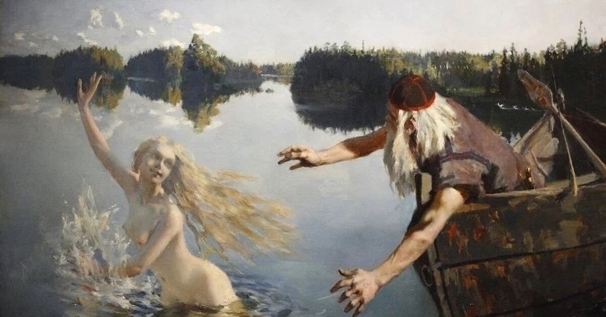 Нагая нимфа лазает по скалам у моря Нагая нимфа лазает по скалам у моря